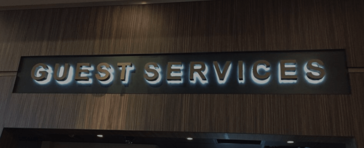 company electrical sign installed at building interiors dallas tx