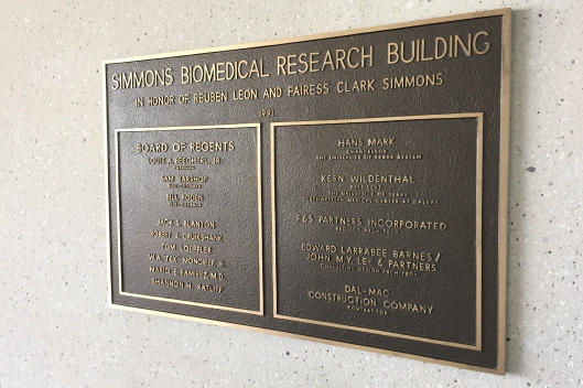 sign on wall in research building dallas tx
